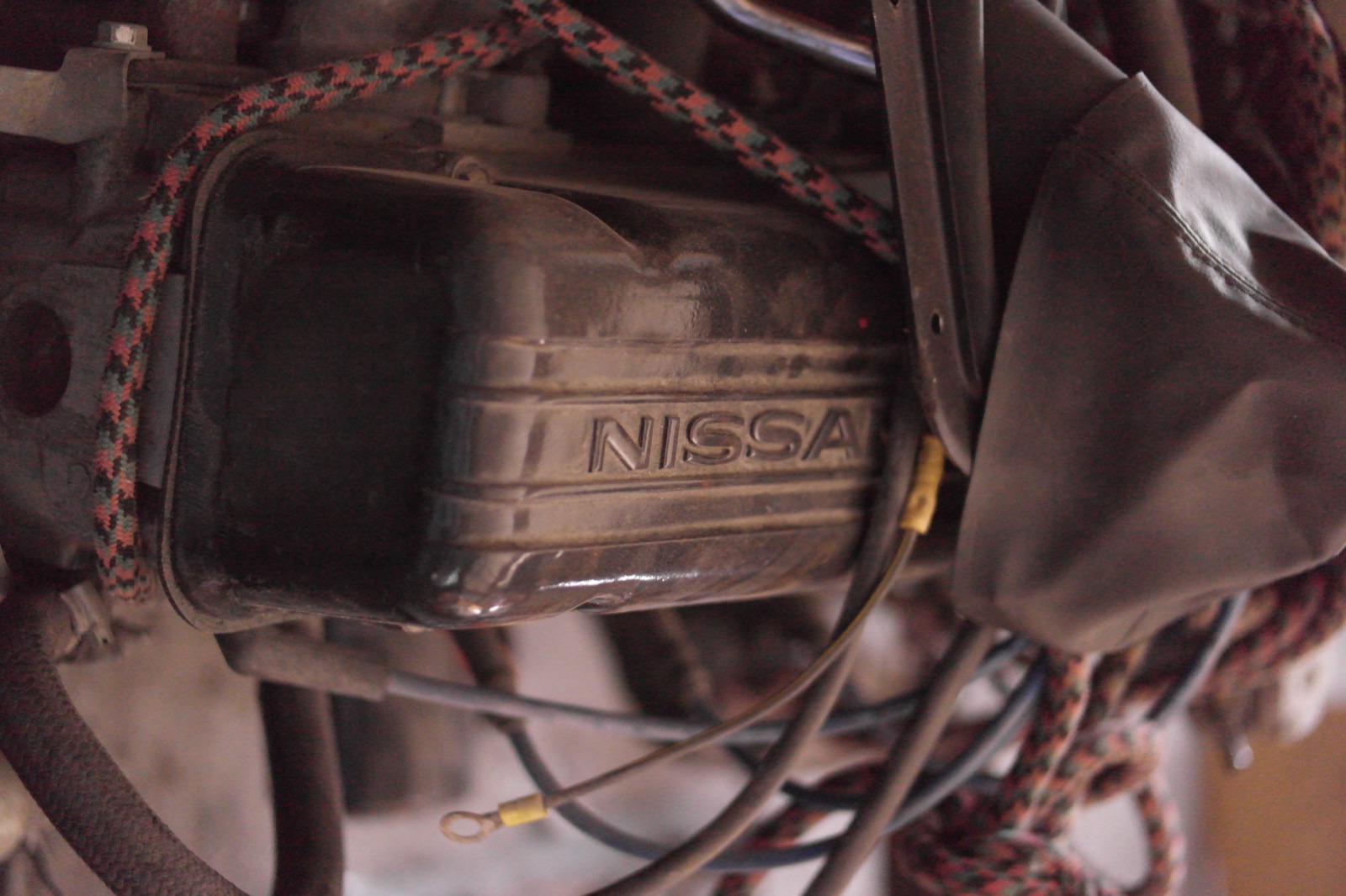 Detal Datsuna z oznaczeniem Nissan